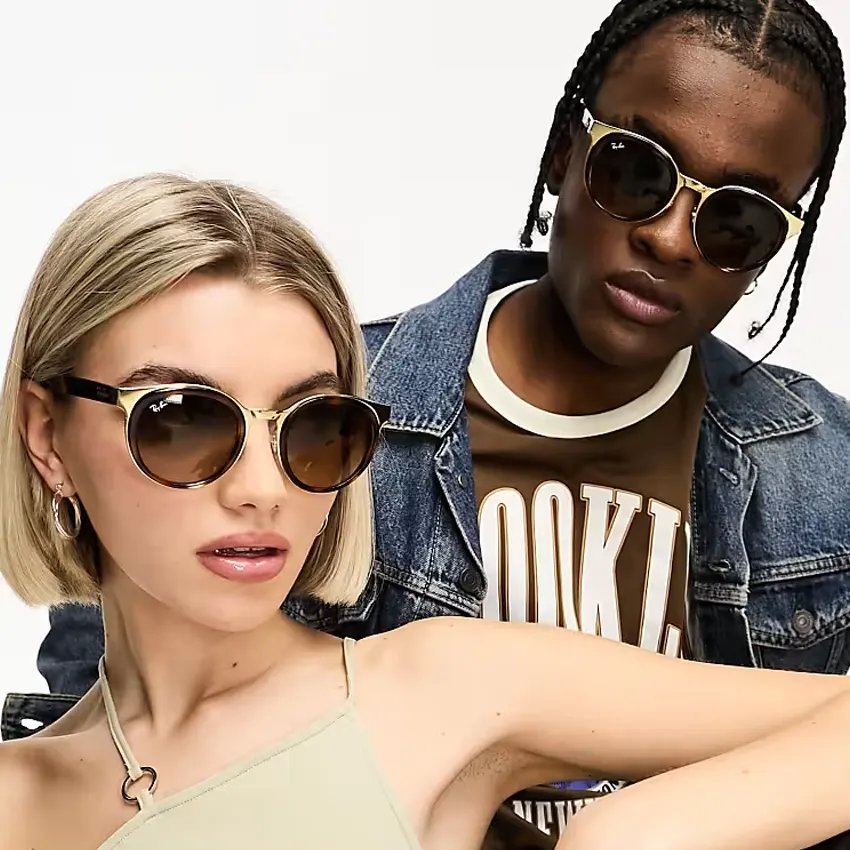Two people in Ray-Ban sunglasses from the brand's campaign